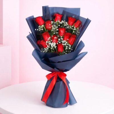 Buy Red Roses Bouquet Navy Blue Wrapping online in Jaipur for romantic gifting