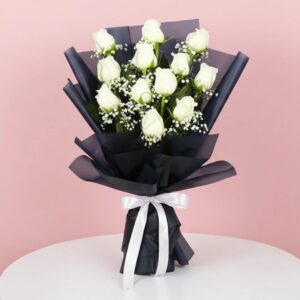 Buy White Roses in Black Wrap online in Jaipur for premium flower gifting
