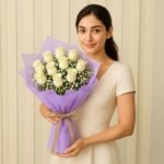 White Roses in Purple Wrap bouquet online delivery in Jaipur with fresh white roses